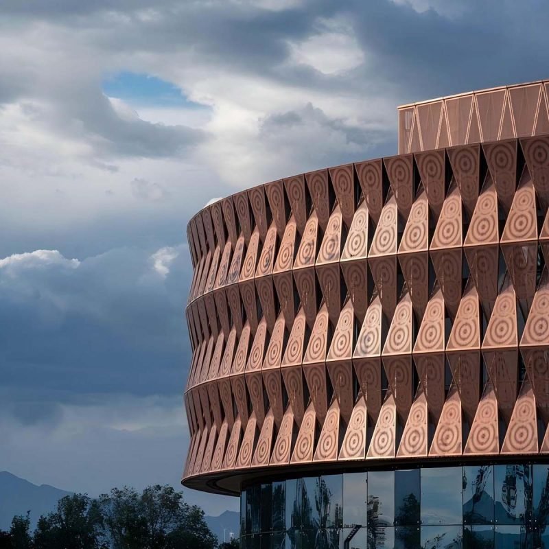 Copper facade & wall cladding panels of TBK Metal, showcasing natural patina and luxurious finish for modern architectural designs.