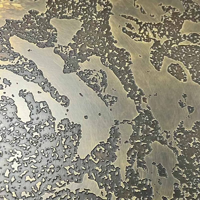Etched stainless steel sheet metal by TBK Metal Australia, featuring detailed surface patterns and textures for decorative, architectural, and industrial design applications.