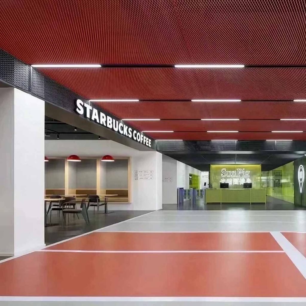 Expanded metal mesh ceiling panels with an open geometric surface