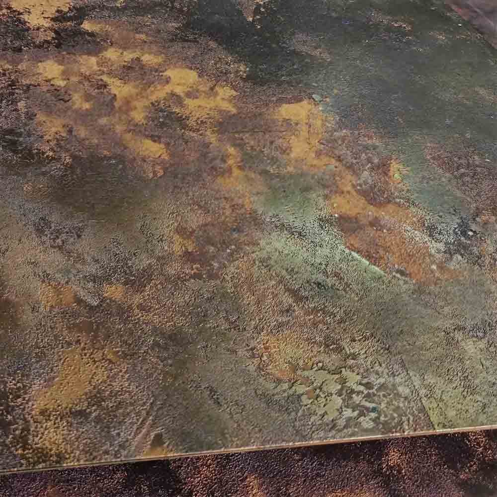 Patina finish stainless steel with a weathered metallic surface for architectural and interior applications