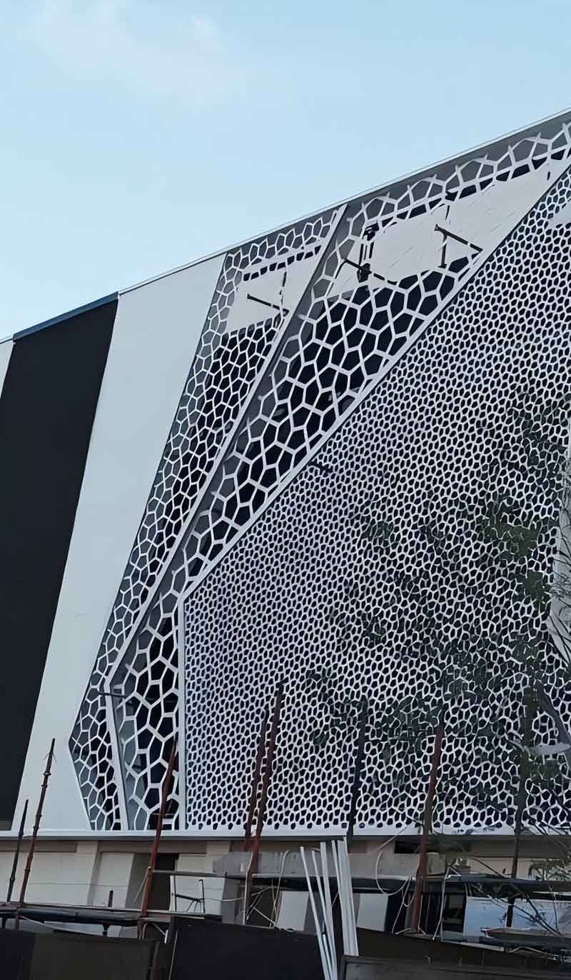 Architectural metal facade cladding project with custom designed exterior panels