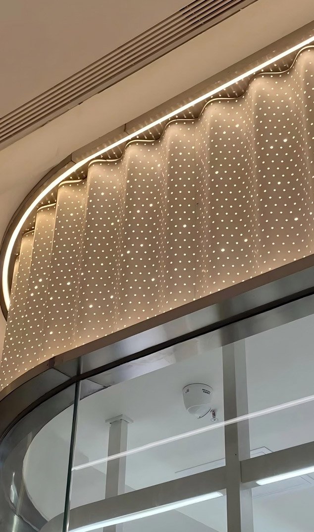 TBK Metal Australia corrugated stainless steel sheet metal project used in modern building facade and exterior cladding application
