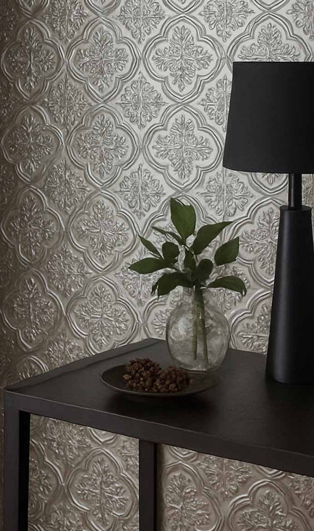 Embossed metal sheet used in a completed architectural project