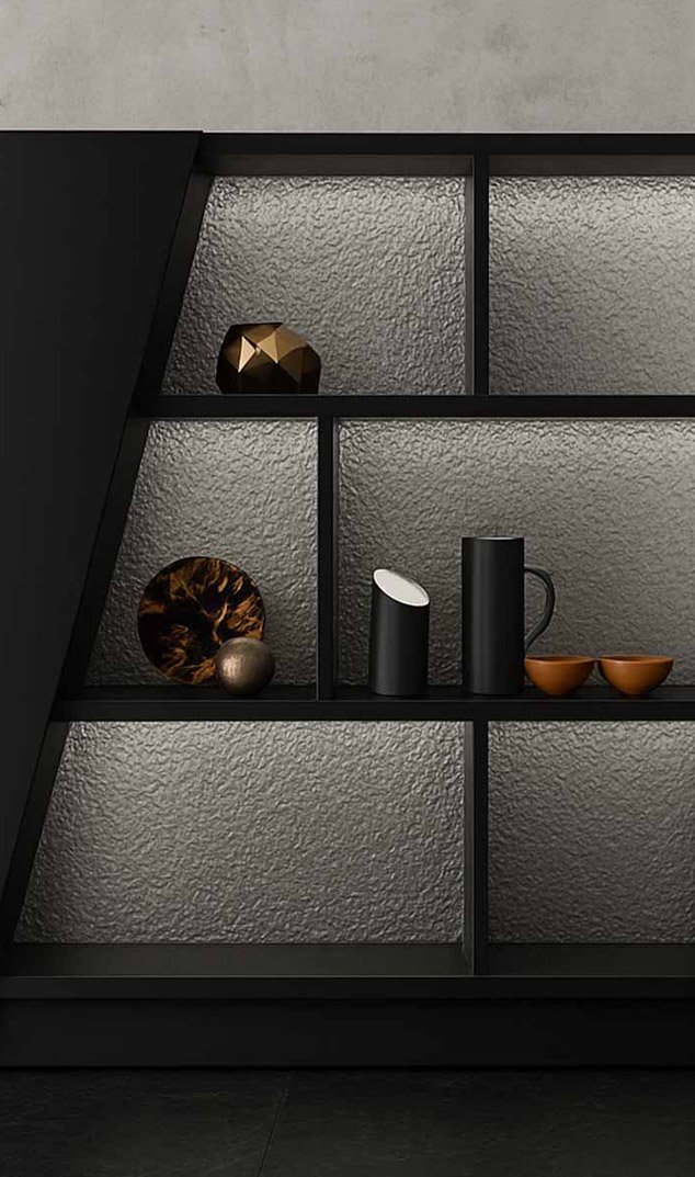 Embossed metal sheet installation showcasing patterned stainless steel detailing