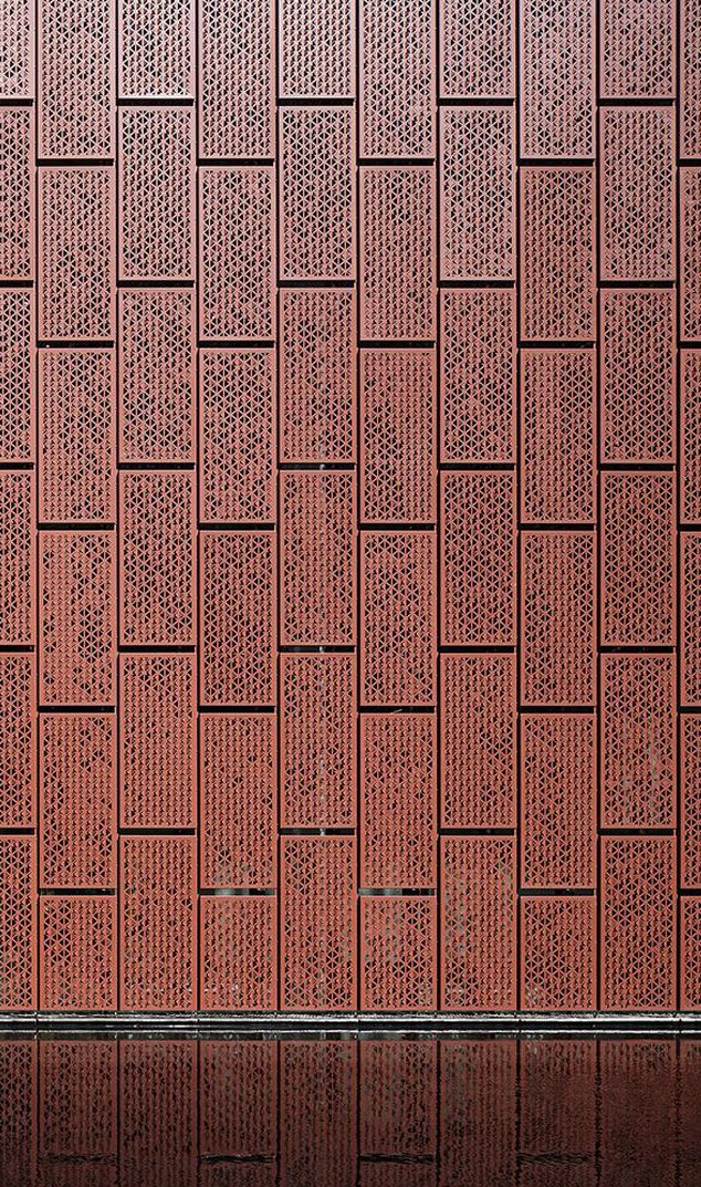 Stainless steel perforated sheets metal panels in an architectural project