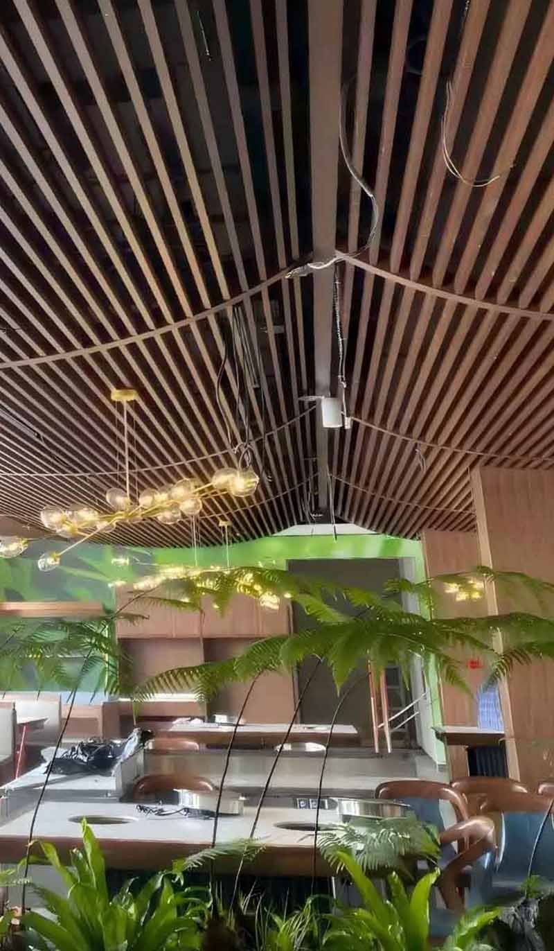 Custom suspended metal ceiling installation for modern architectural interiors