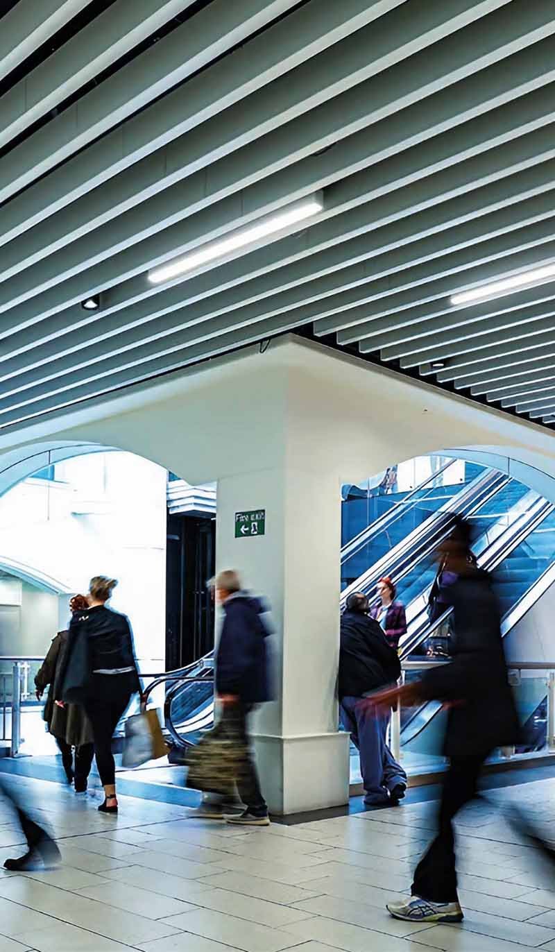 Custom suspended metal ceiling system showcased in an architectural project