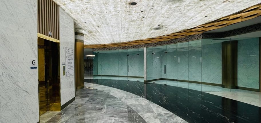 Aman Hospital in Doha featuring custom stainless steel metalwork and architectural detailing