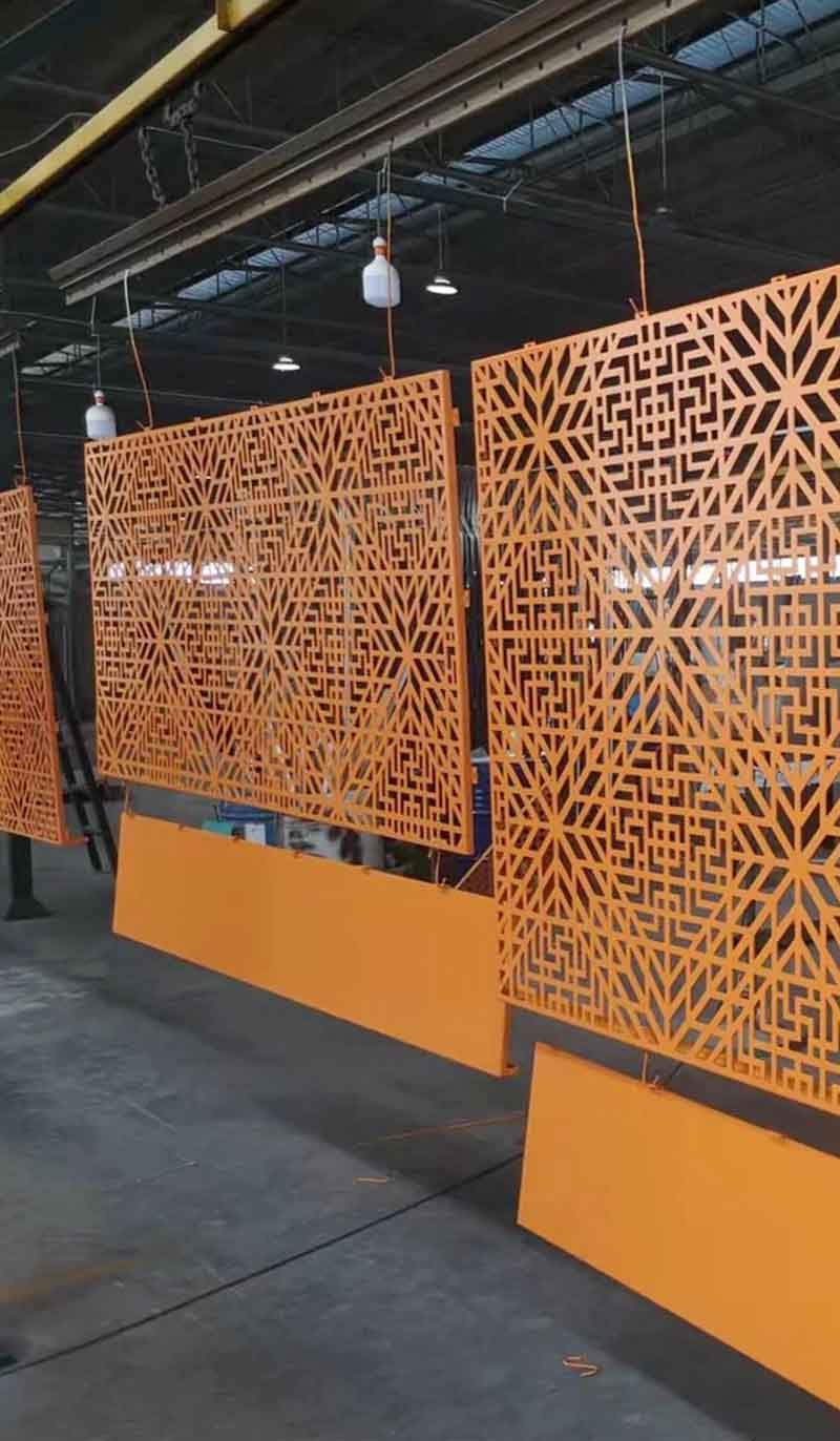 Custom laser-cut facade panels with decorative patterns for architectural metal cladding applications