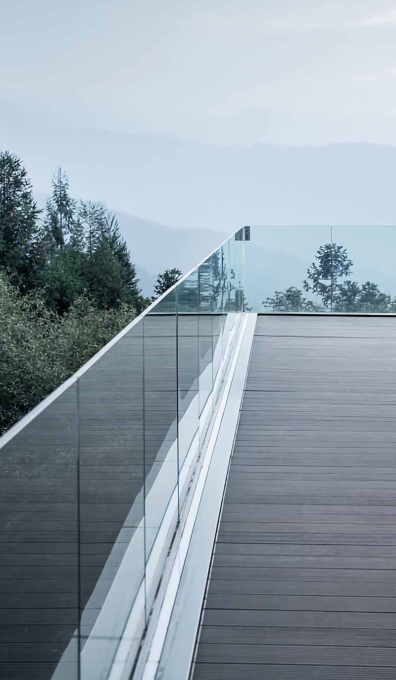 Custom architectural railing and balustrade design with metal and glass components