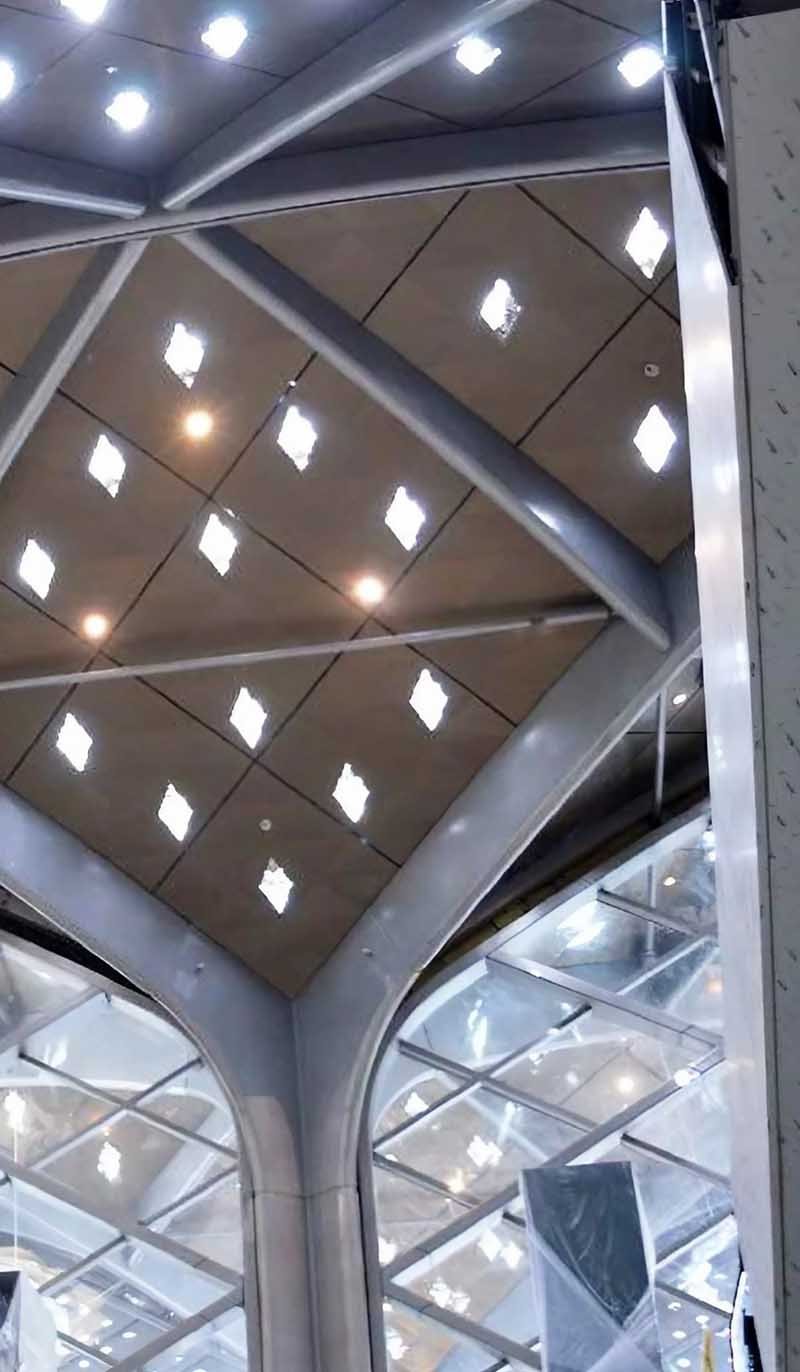 Custom metal roofing options for airport terminals and train station canopies