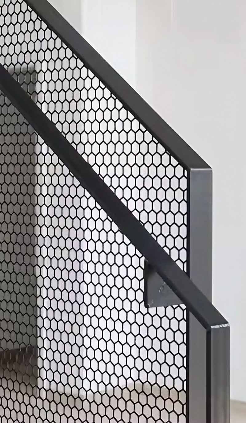 Architectural railing and balustrade project featuring custom metal panels