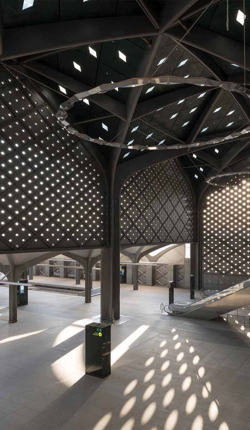 Custom metal roofing with an expansive canopy for a modern transportation terminal