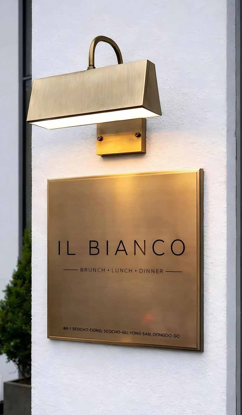 Customized stainless steel signage featured in an architectural project