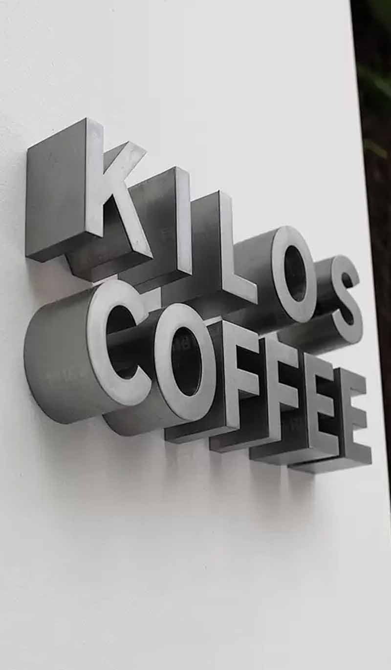 Customized stainless steel signage for professional architectural identification