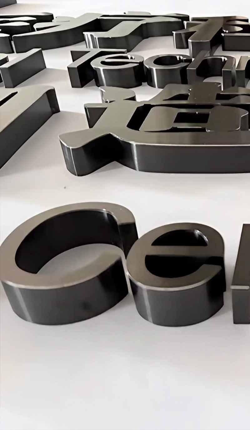Custom stainless steel signage used for architectural project identification