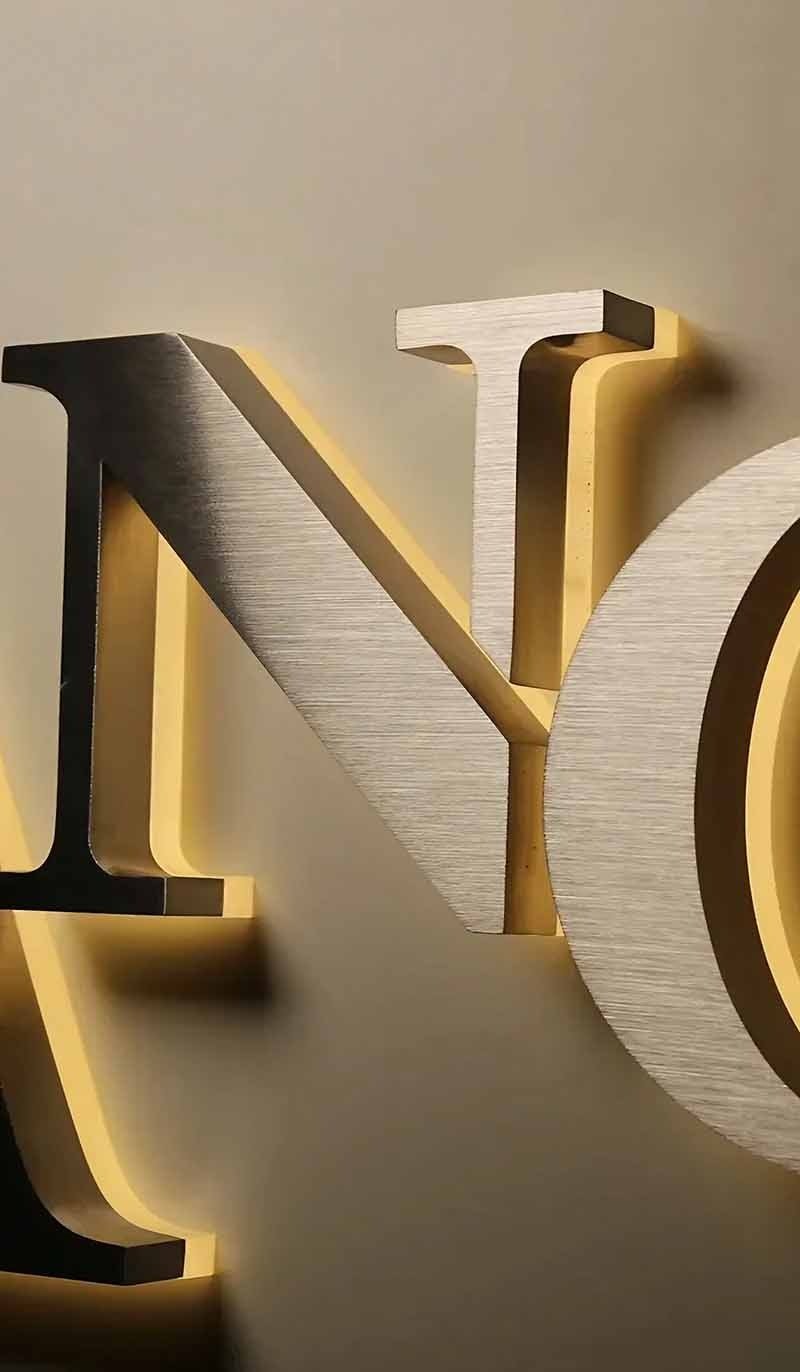 Customized stainless steel signage for distinctive architectural branding