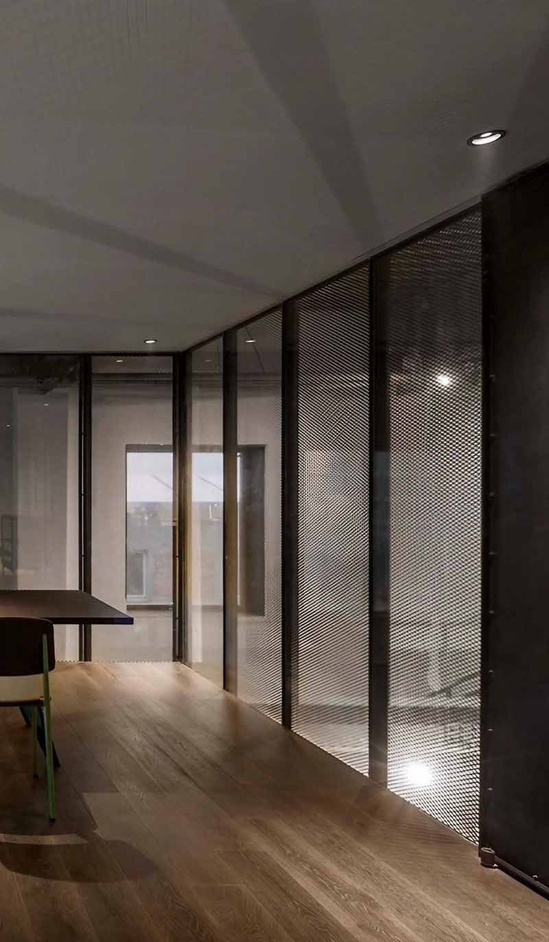 Decorative metal divider screen project featuring custom patterns for modern architectural interior design