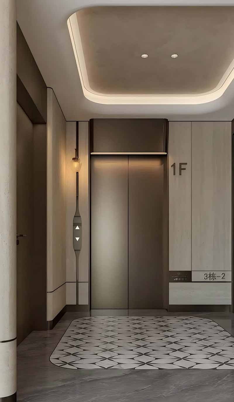 Stainless steel elevator wall cladding around interior elevator doors