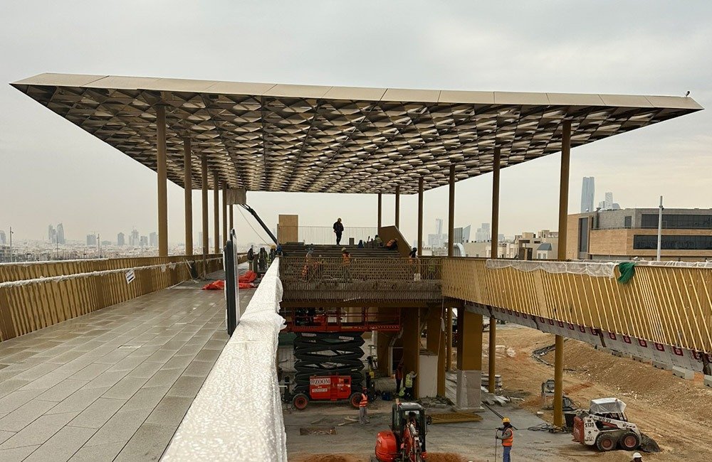 Architectural metal facade and pedestrian bridge canopy at Sports Boulevard Riyadh by TBK Metal