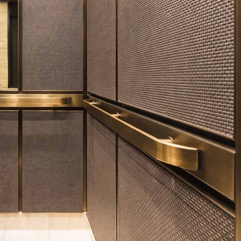 TBK Metal's stainless steel elevator railings & handrails with polished finish for safe and modern elevator cabin interior design