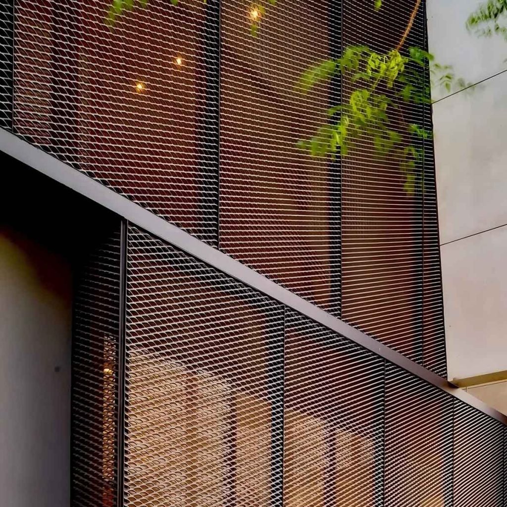 Expanded stainless steel facade panels for contemporary building cladding