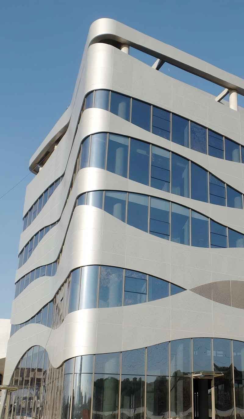 Architectural aluminium composite facade panels installed on modern exterior wall system