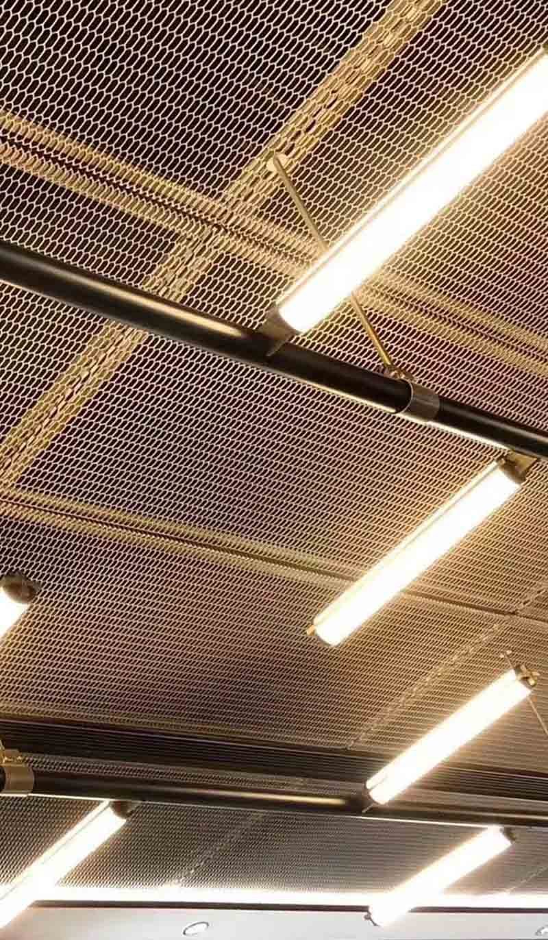 Expanded metal mesh ceiling panels installed in a contemporary architectural project