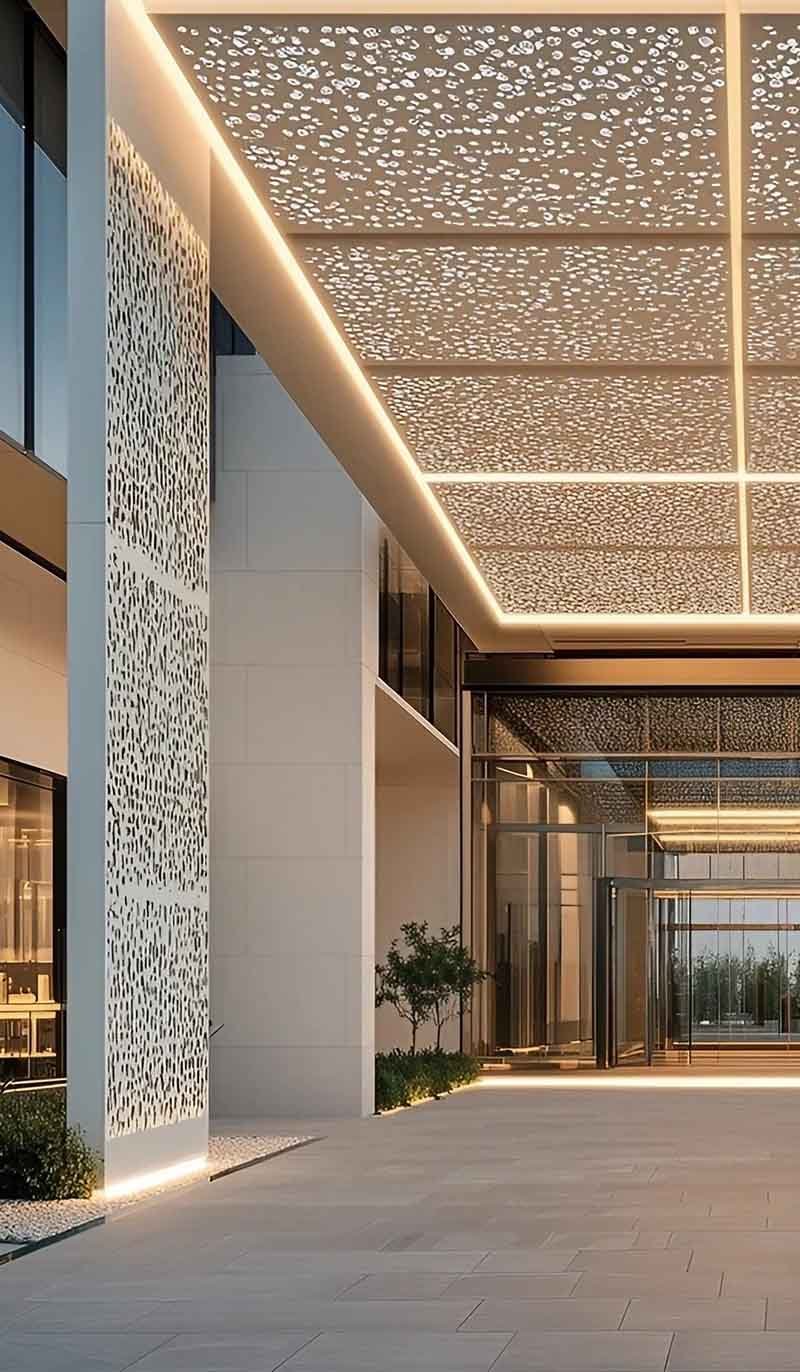 Laser-cut metal ceiling panels installed in modern interior space with decorative aluminium perforated pattern design