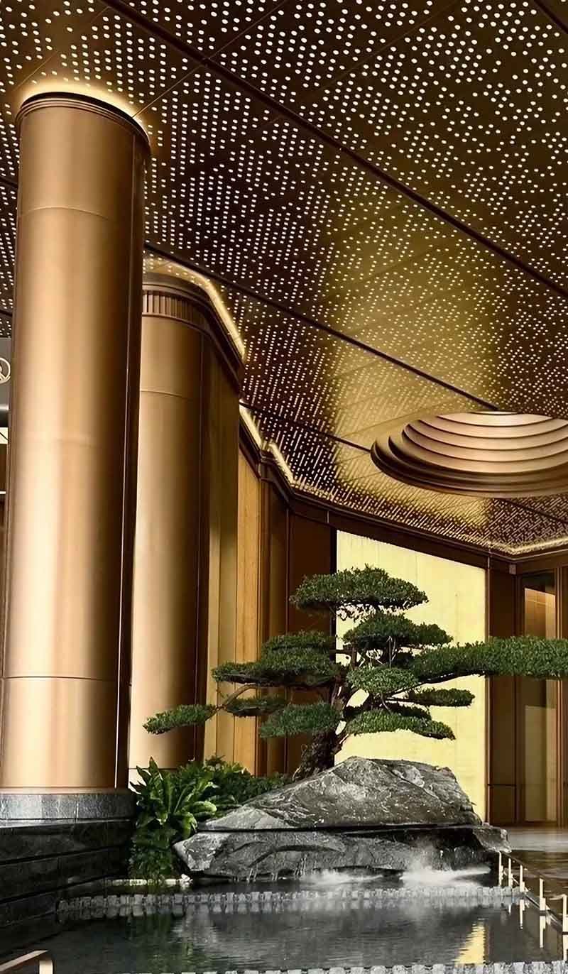 Perforated metal ceiling system featured in a modern architectural project