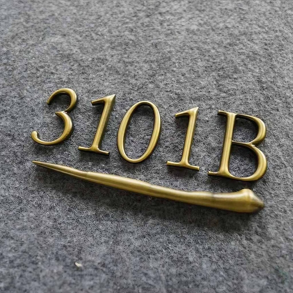 Custom stainless steel house numbers for contemporary property entrances