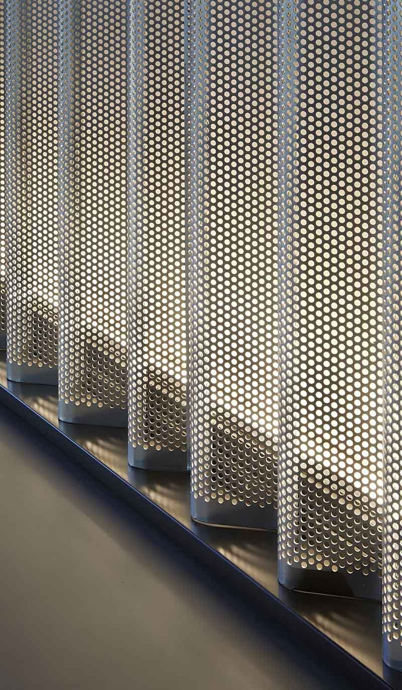 Aluminium perforated metal screen panels used in a modern architectural project
