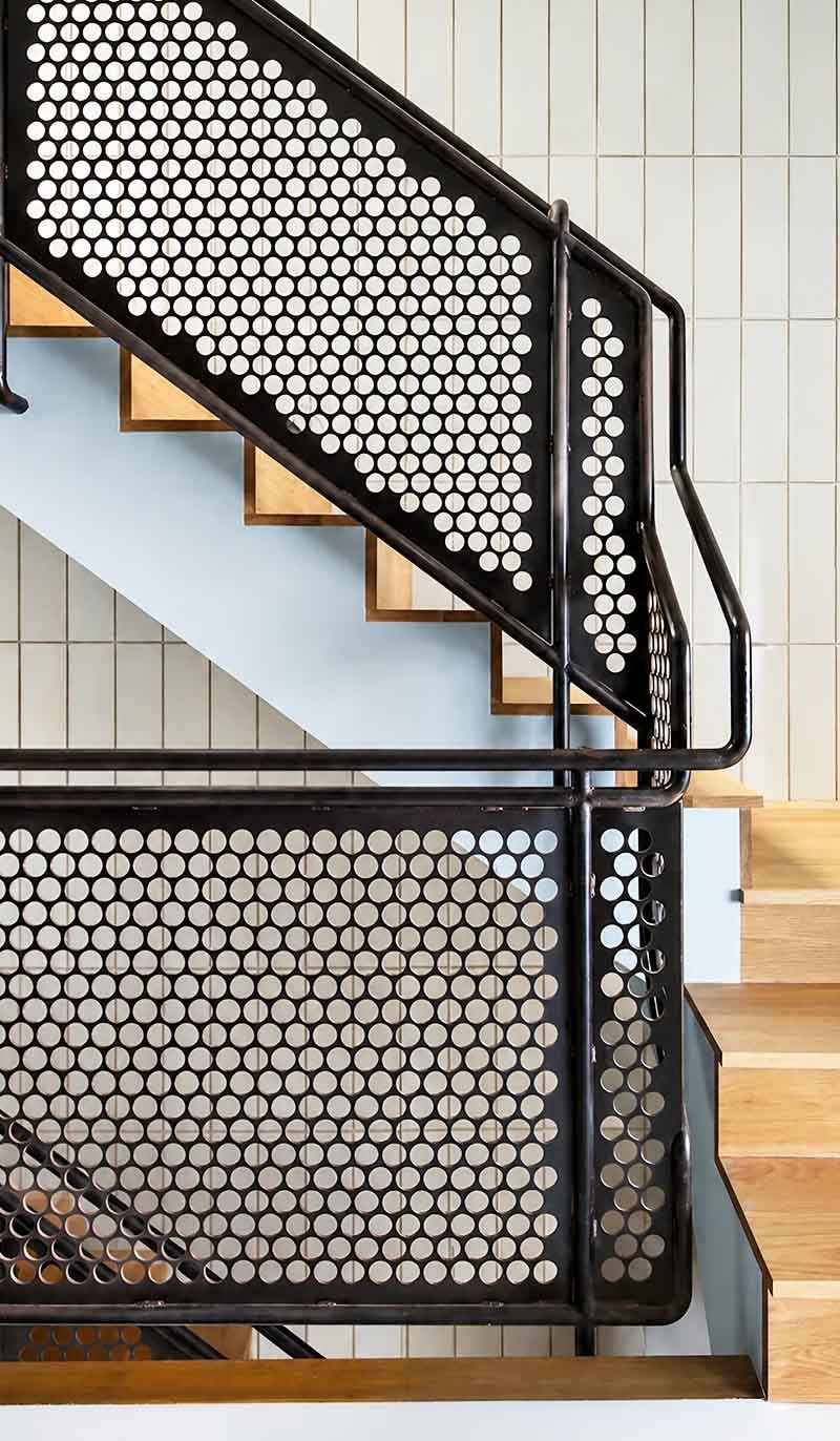 Perforated metal balustrades and railing panels in a modern architectural project