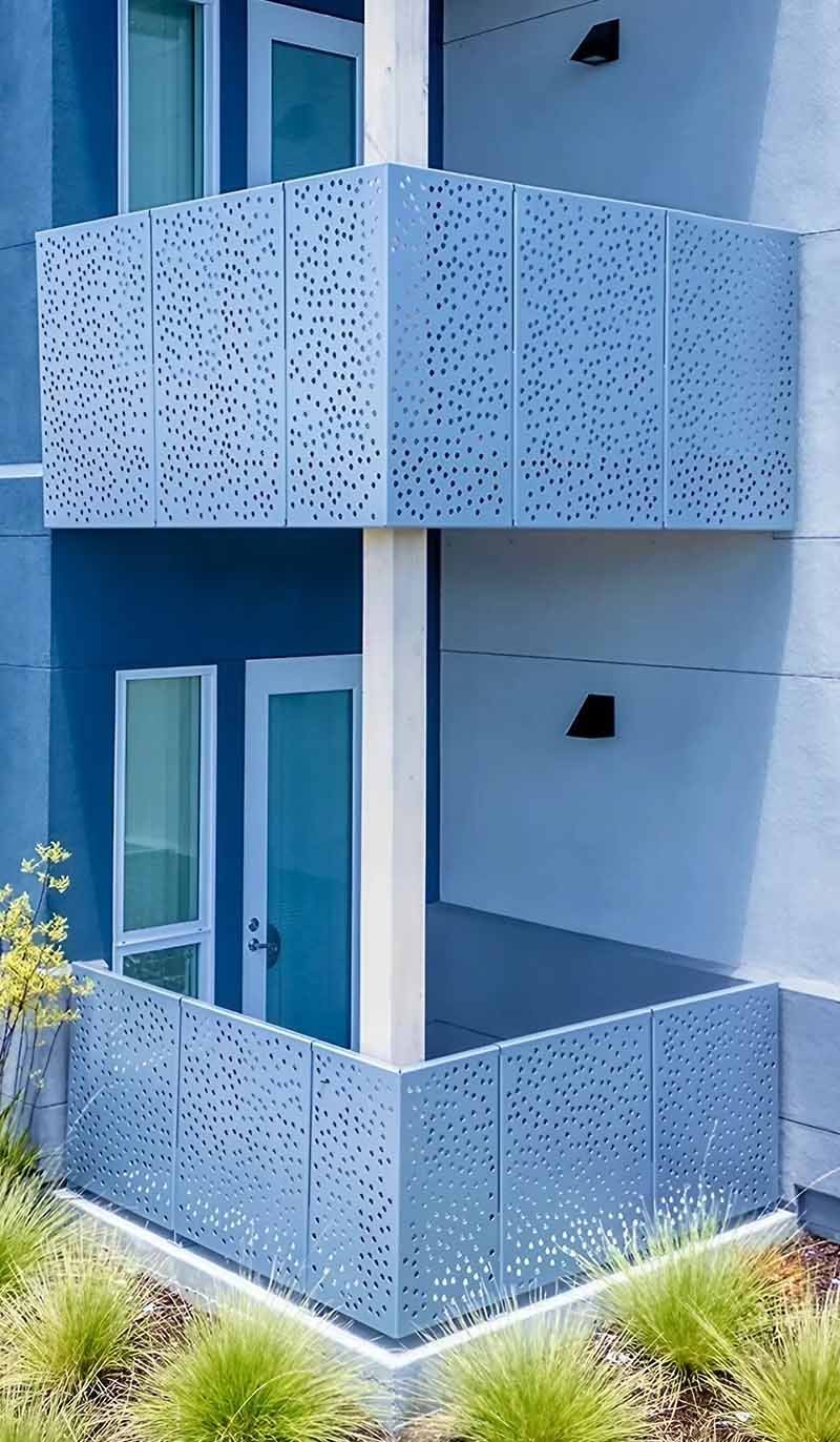 Custom perforated metal railings and balustrades for a contemporary architectural project