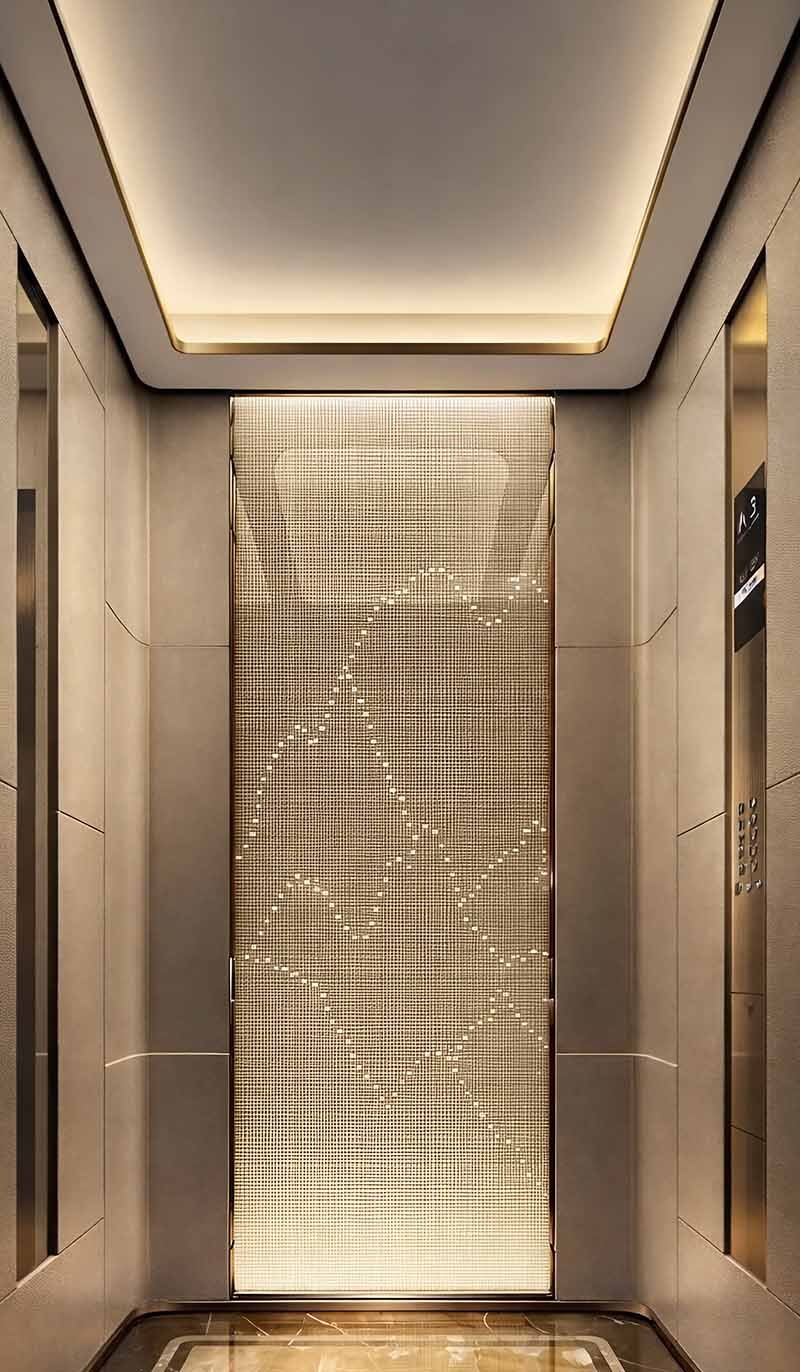 Custom stainless steel elevator ceiling panels in a modern interior project