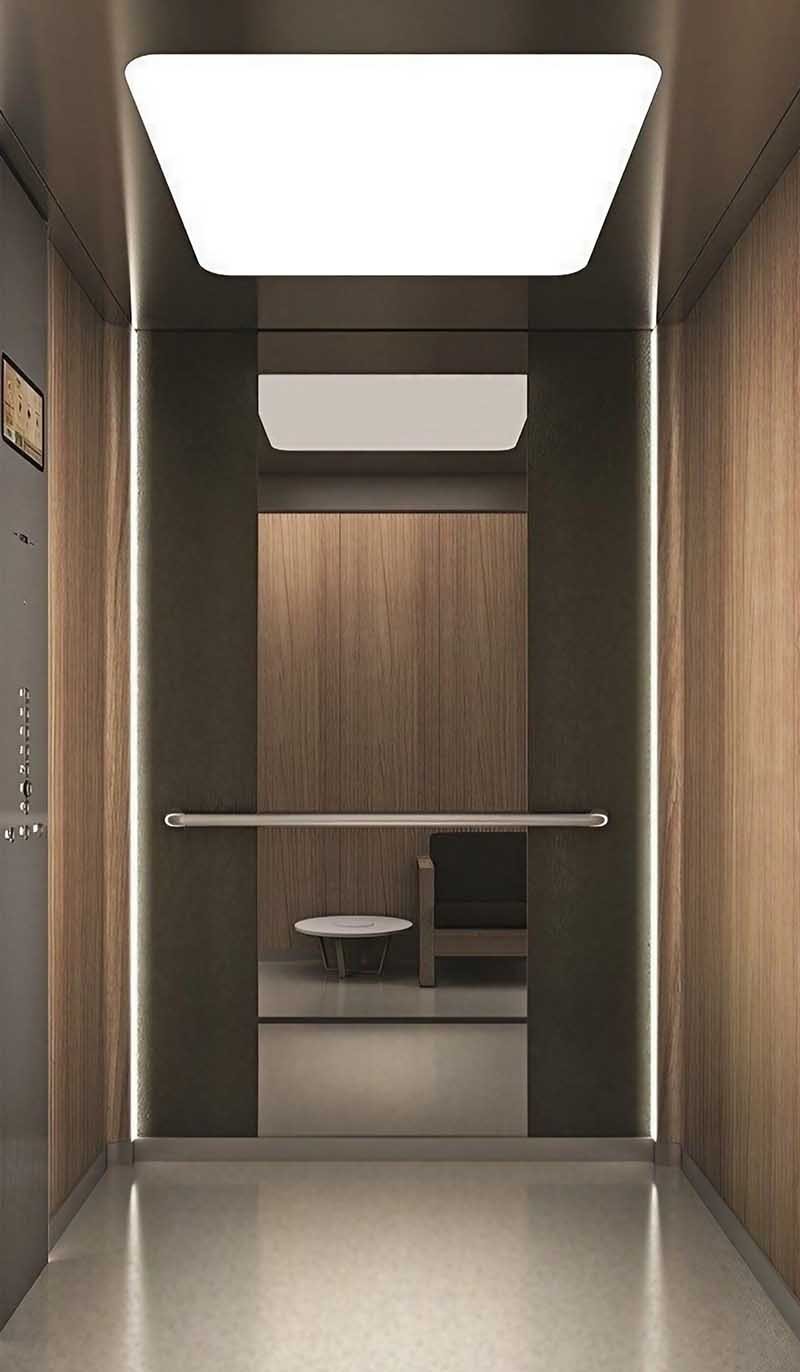 Stainless steel elevator ceiling detail with custom panels in an architectural project