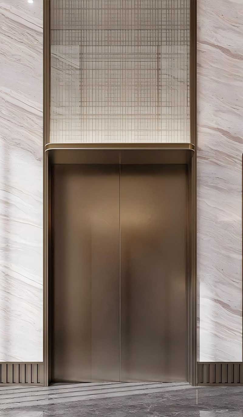 Stainless steel elevator door panels in a completed architectural project