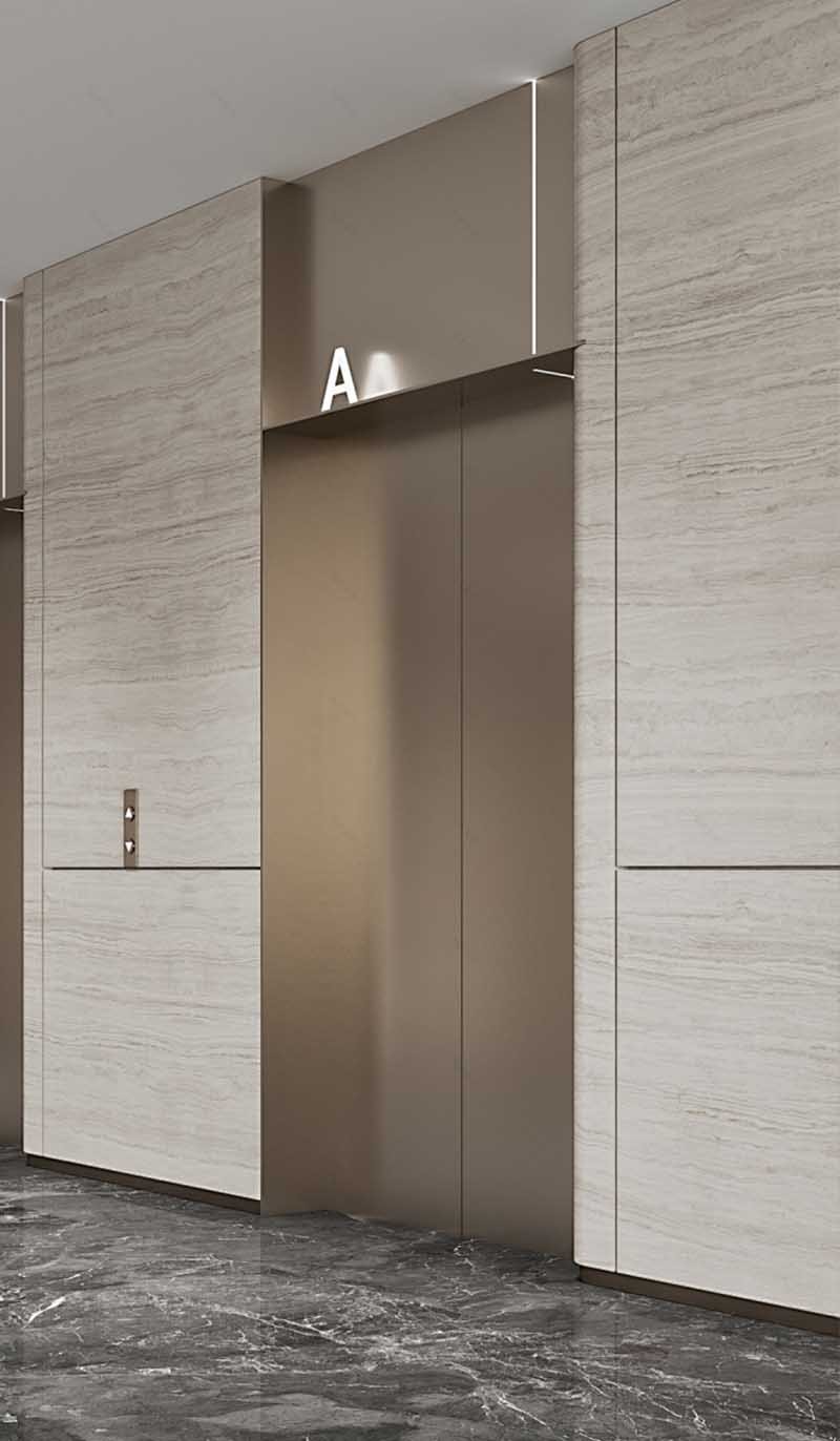 Stainless steel elevator door panels installed in a contemporary architectural project