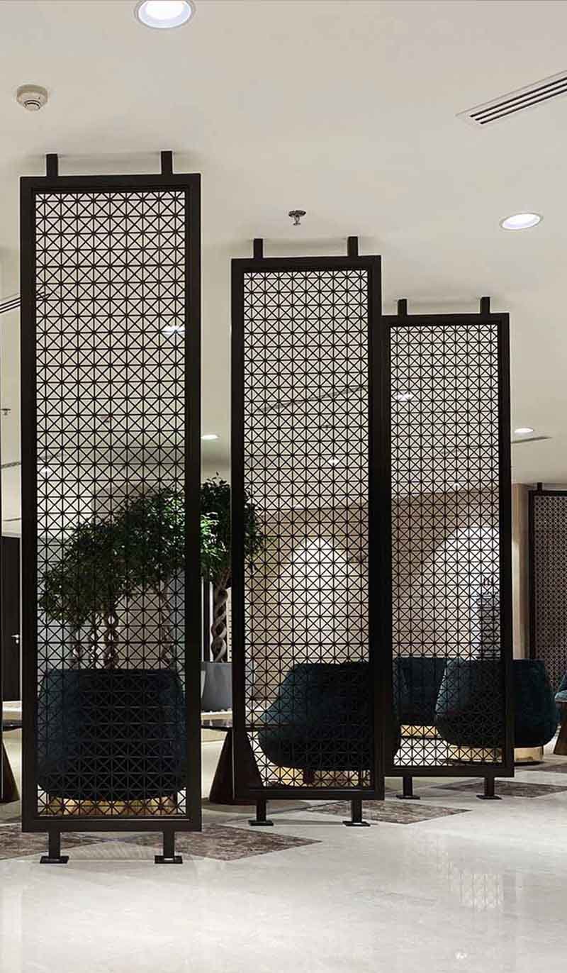 Stainless steel laser-cut screen panels for decorative architectural applications
