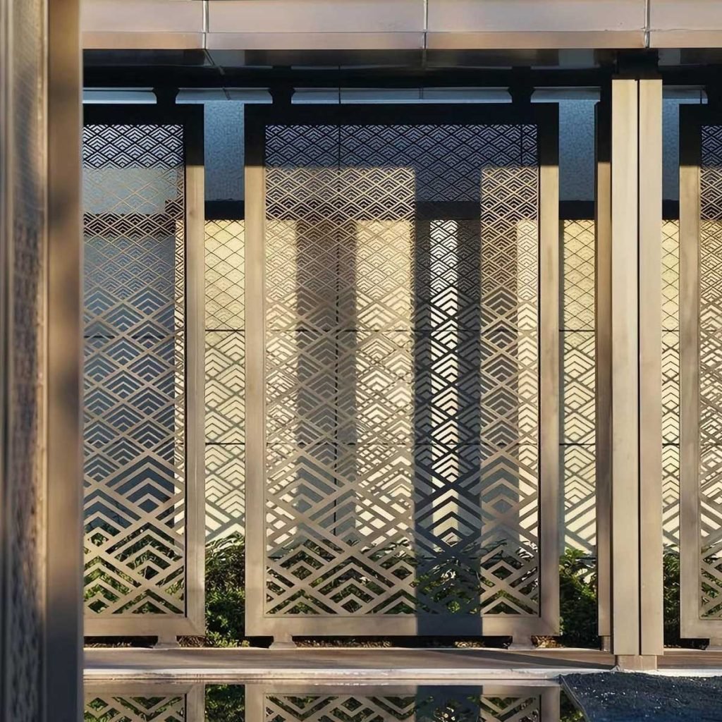Stainless steel laser-cut decorative metal screen panels with modern geometric patterns for architectural facade and privacy screening