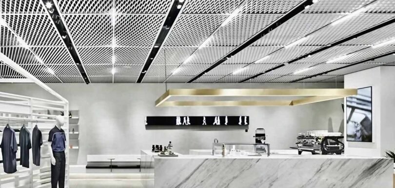 Expanded metal retail store interior design featuring modern displays and decorative architectural metal elements