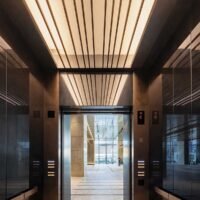 Architectural metal mesh facade creating sustainable exterior designs with modern patterns and functional building solutions