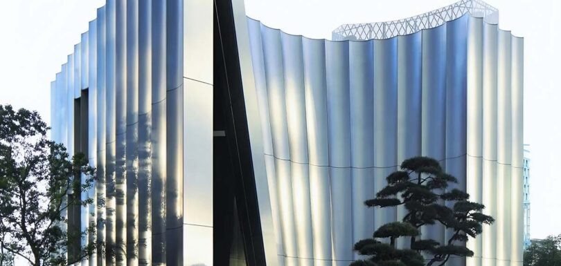 Sustainable stainless steel architecture featuring durable metal surfaces and environmentally responsible design solutions