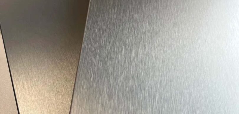 Brushed finish stainless steel surface showcasing elegant texture, durability, and timeless architectural appeal