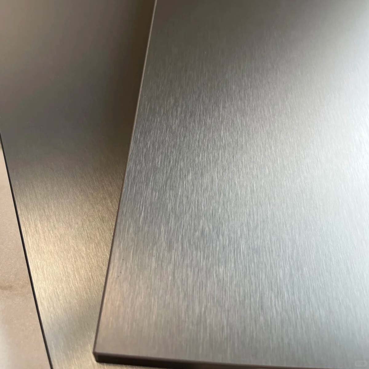 Brushed finish stainless steel surface showcasing elegant texture, durability, and timeless architectural appeal
