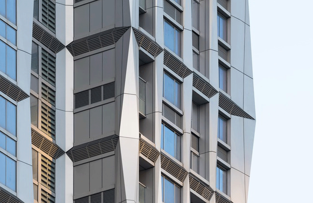 Double-curved aluminium facade detail at UIC Building Singapore