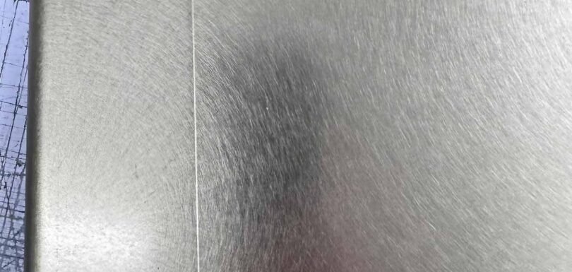 Vibration finish stainless steel surface featuring unique textured patterns for architectural and interior applications
