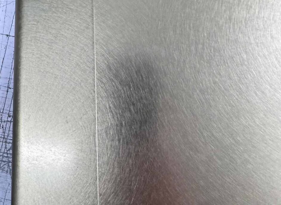 Vibration finish stainless steel surface featuring unique textured patterns for architectural and interior applications
