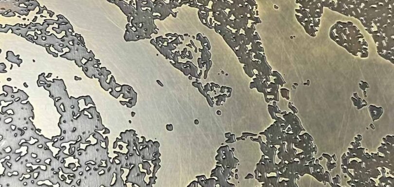 High precision laser etched stainless steel surface with accurate patterns and innovative architectural design options