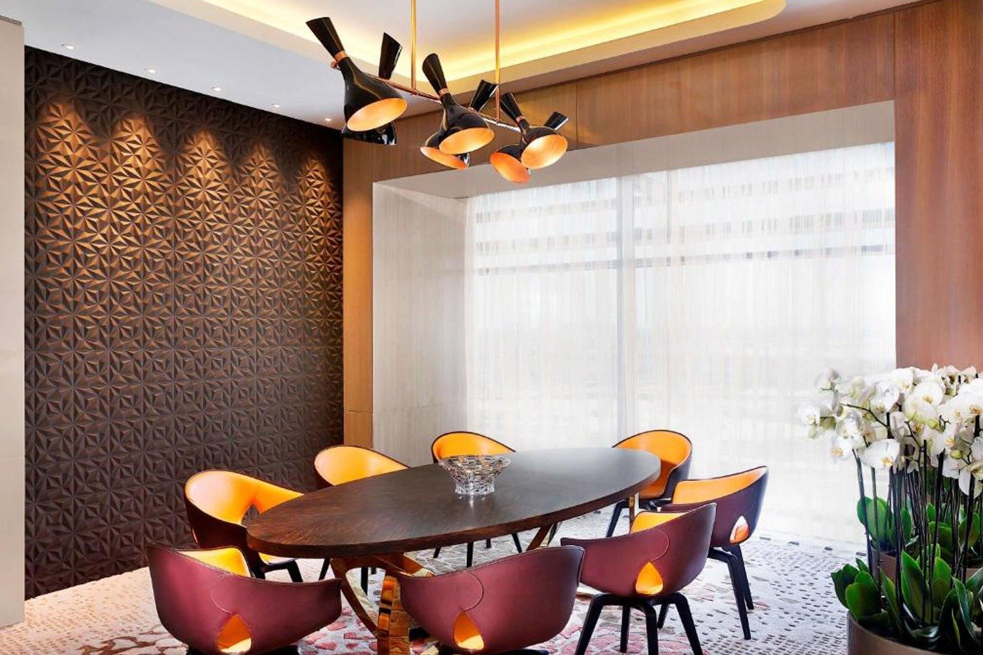 Geometric metal wall panel in AlRayyan Hotel dining area